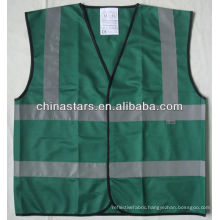 high visibility dark green safety vest